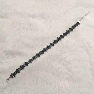 Black flower-patterned choker